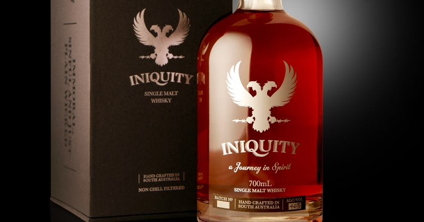 Iniquity Single Malt Whisky Bottle & Box Packaging - Complete Boxed Set, close up Foiled Box and Screenprinted Bottle