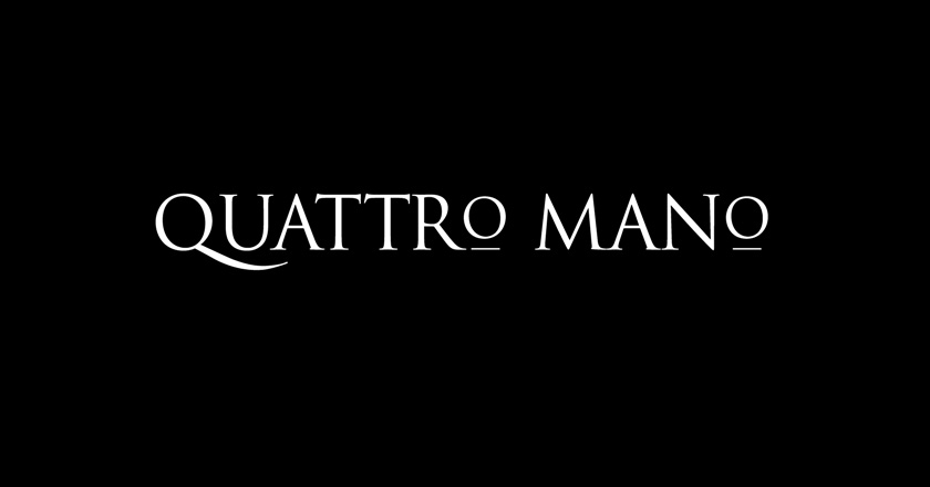 Quattro Mano Company Logotype on Black